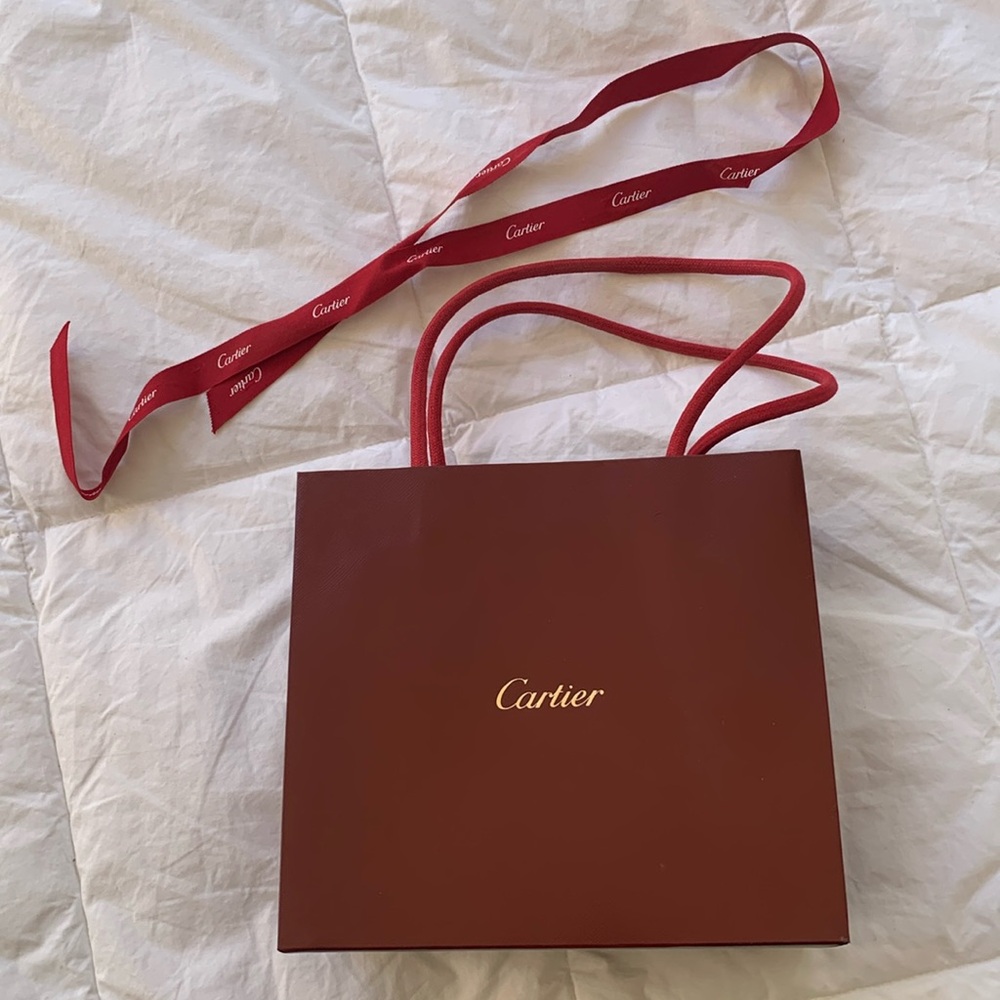 Small Cartier bag and ribbon